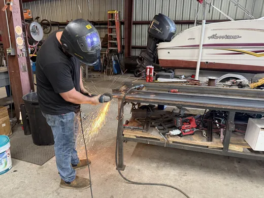 RedLine welder fabricating a steel frame in the Ocala, FL shop